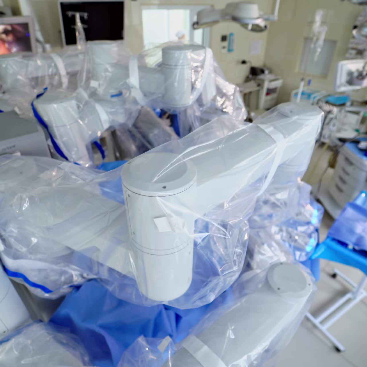 Robotic surgical system in hospital. Robot for minimally invasive operations controlled by the surgeon