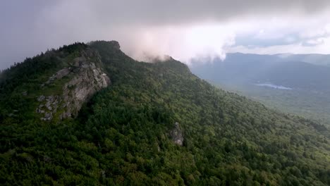 clouds hover over grandfather mountain aerial from linville nc, north carolina