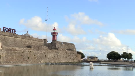 santa catarina fort with its red lighthouse