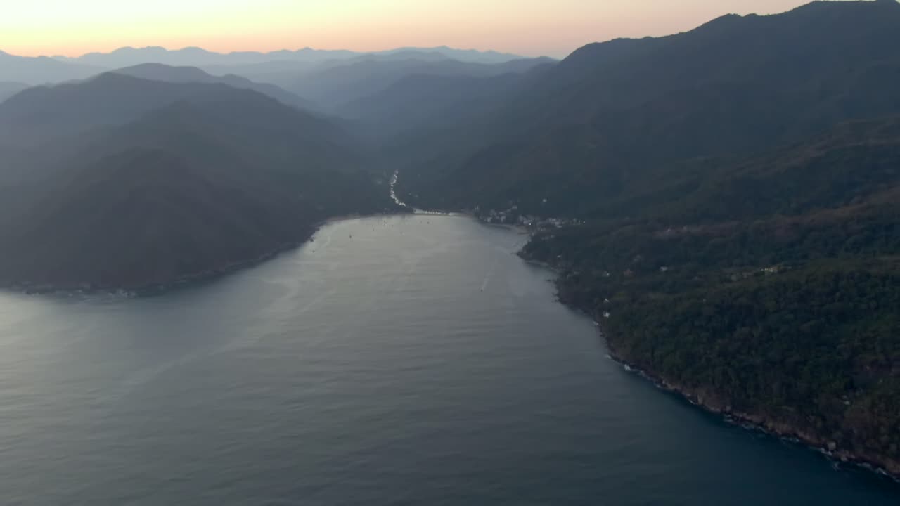 Idyllic Ocean Revealed Misty Mountainscape In Yelapa Beach Town At Early Morning In Jalisco, Mexico. Aerial Tilt-up Shot