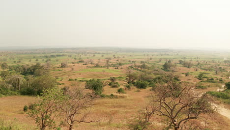 Traveling-ahead-in-the-African-savanna,-drone-4k,-Angola,-Africa-3