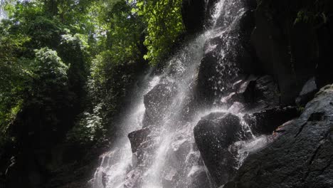 mesmerizingly illuminated kanto lampo waterfall cascades gracefully, creating a scene of ethereal beauty and wonder