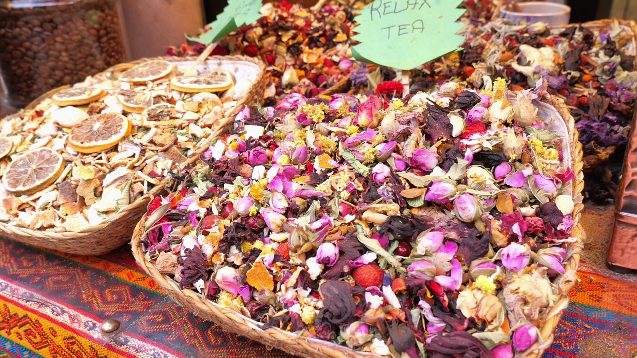 Vibrant Dried Herbal Tea and Flowers Displayed at a Market