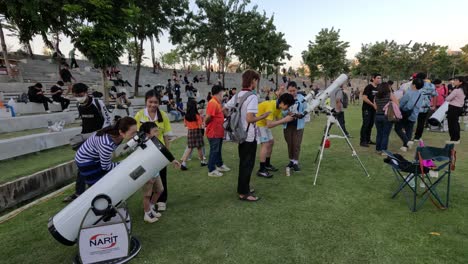 people gathering for a public stargazing session