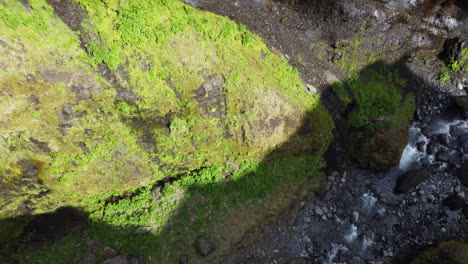 aerial view of the steep canyon walls covered with green moss