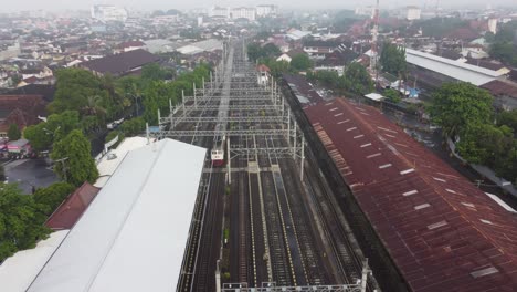 a drone flies over a train station