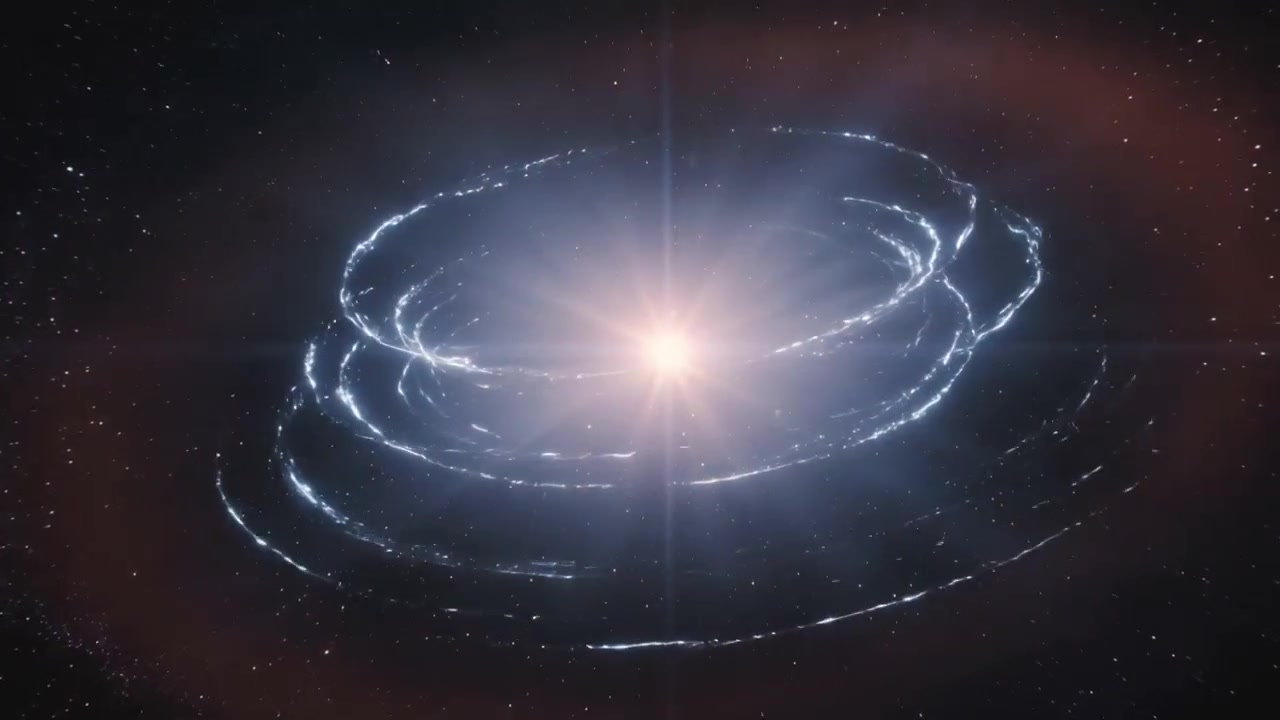 Sorgente centrale che erutta, emettendo raggi e 4 getti cometari nello spazio, formando uno spruzzo di particelle e anelli.