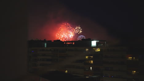 fireworks from august 1st in geneva seen from a private balcony