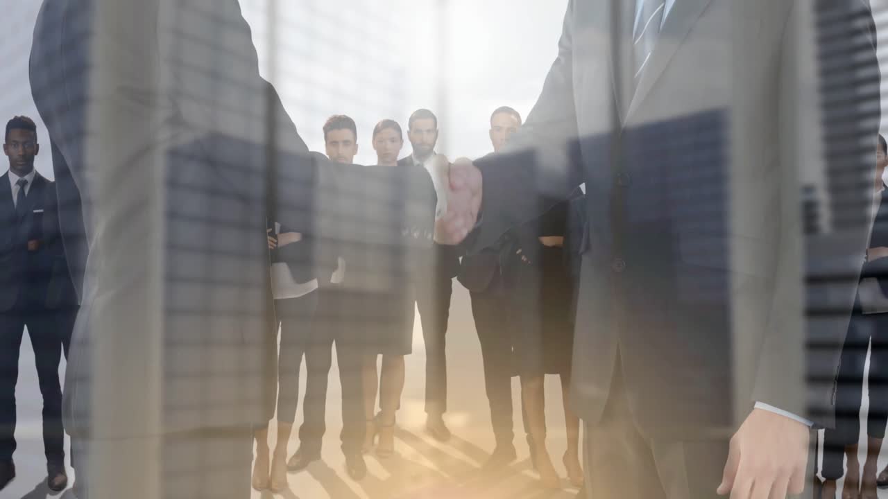 Animation of businessman and businesswoman shaking hands over businessmen and cityscape