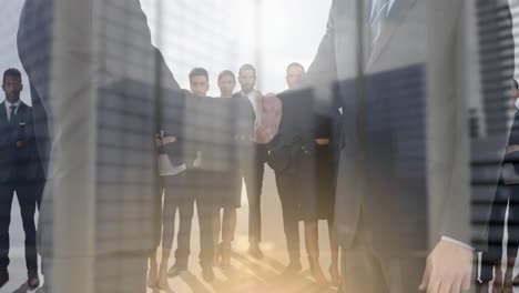 Animation-of-businessman-and-businesswoman-shaking-hands-over-businessmen-and-cityscape