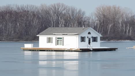 boathouse on a frozen lake