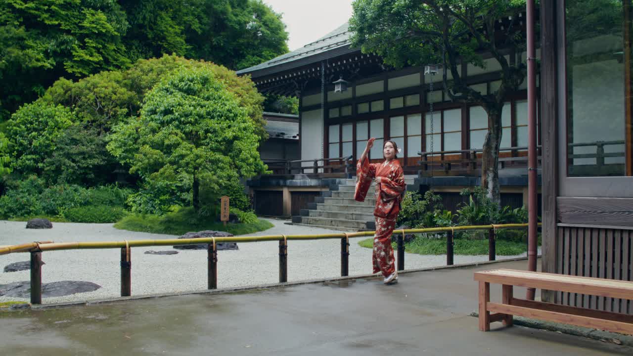 Woman in Kimono at a Japanese Temple Garden