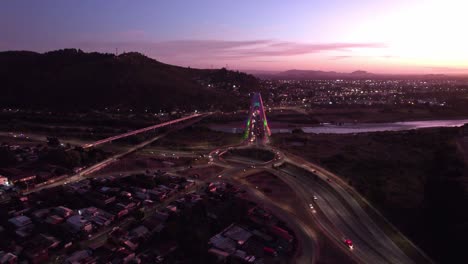 Bridge-over-the-Cautin-River,-Temuco,-Chile---Aerial-Drone-View-at-Night