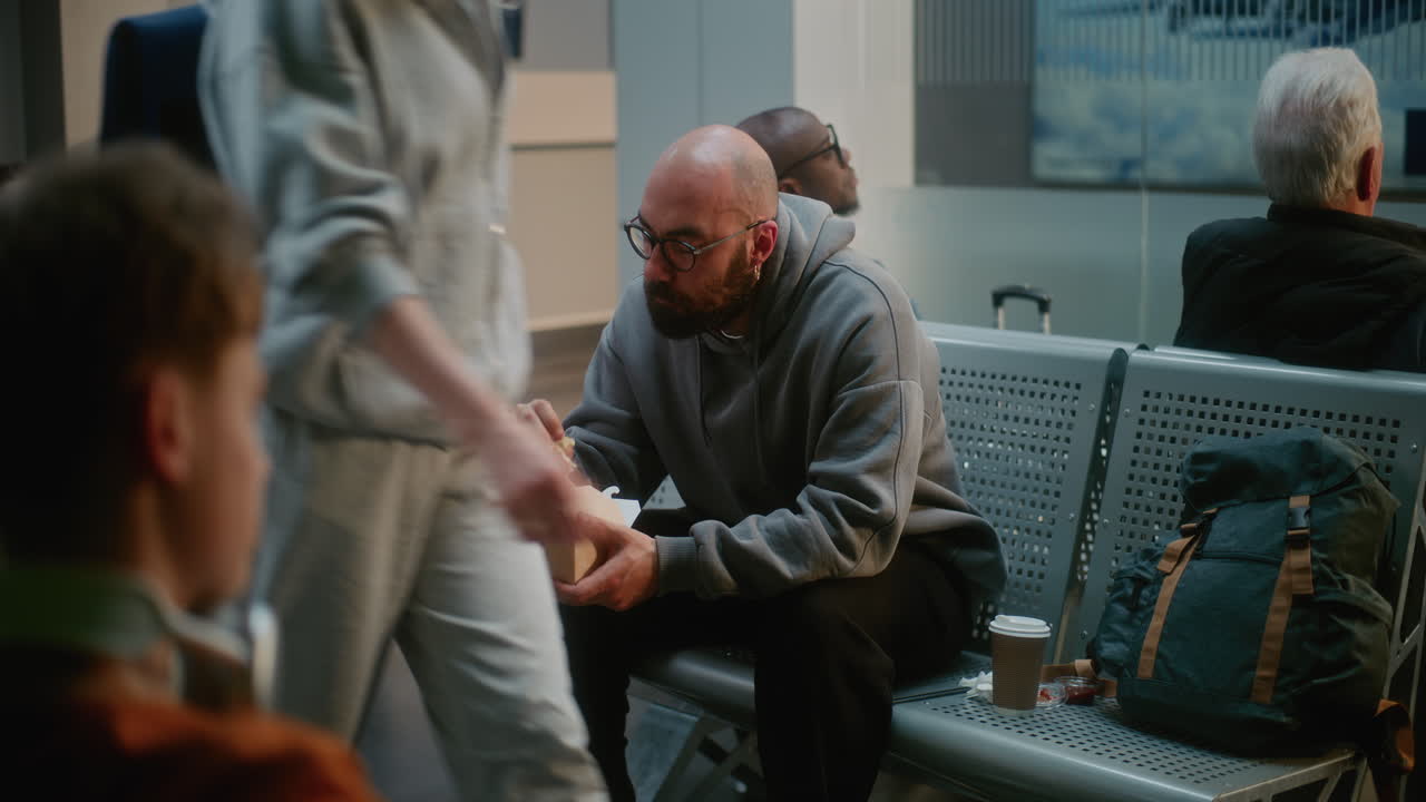 Airport Passengers Waiting and Eating
