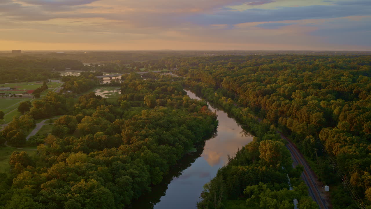 Aerial summer view of the Huron River in Ann Arbor, Michigan, taken from a slowly flying drone.