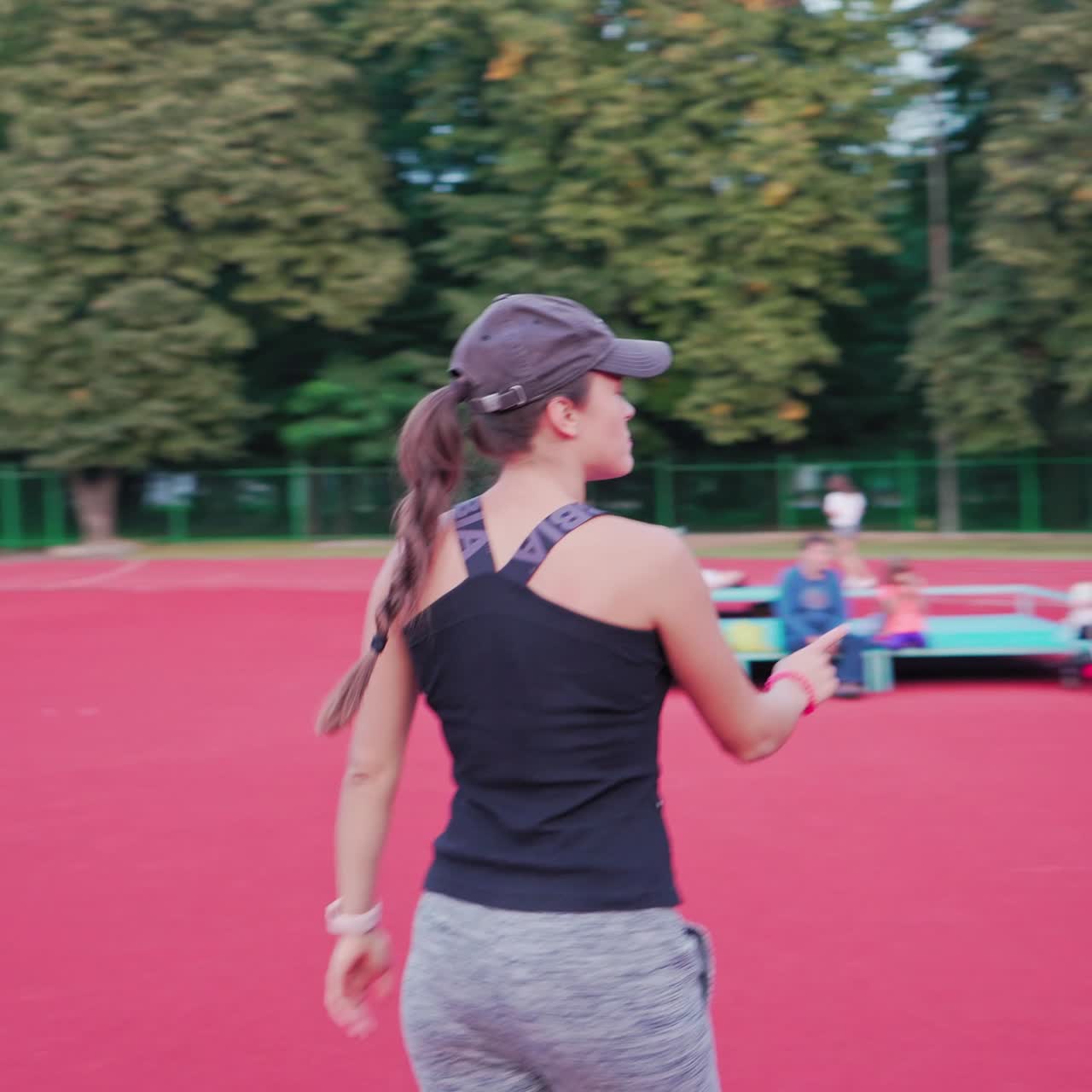 Young athletes doing exercise outdoors