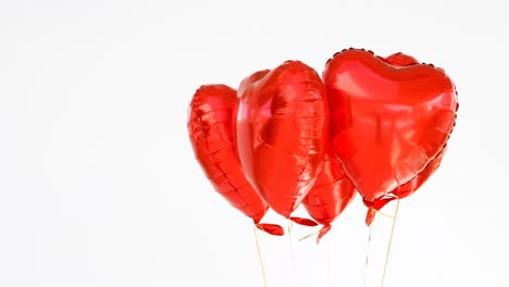 red balloons floating in the air 4k