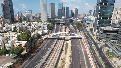 aerial view over the empty highway in tel aviv, israel, during yom kippur the day of atonement - tilt, drone shot