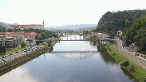 car traffic on tyršův bridge across elbe river in děčín in czechia