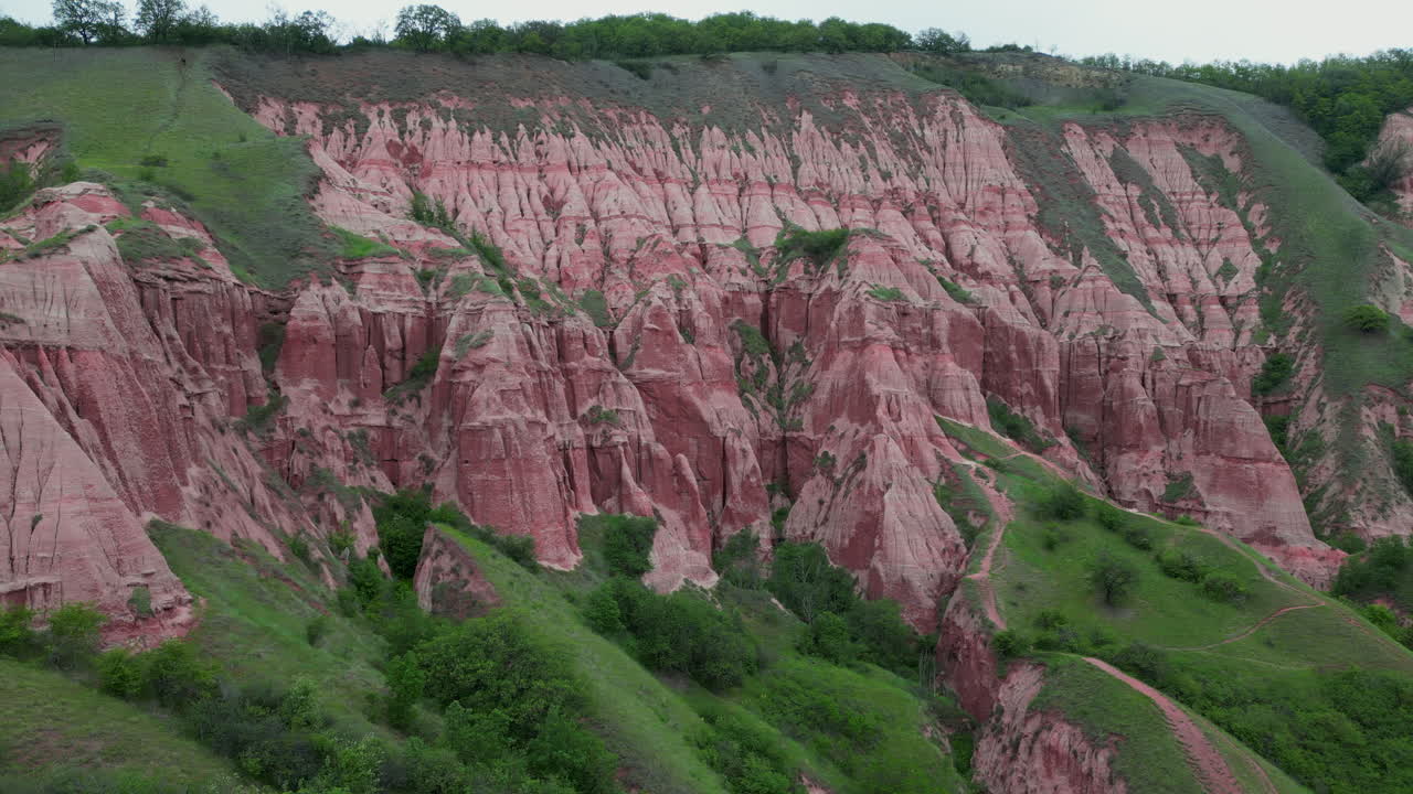 Pink mountain Rapa Rosie in Romania with erosion effects