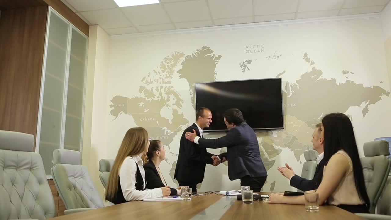 Board Meeting In Modern Office. Business people having board meeting in modern office