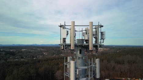 aerial reverse shot of cell phone tower