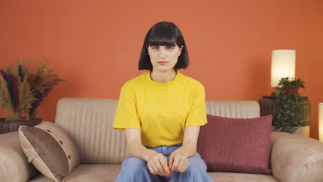 the woman who does not like the news she hears does not approve.