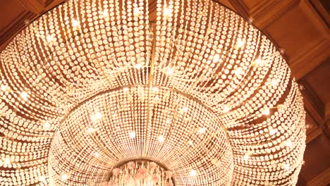 glass large chandelier in theater