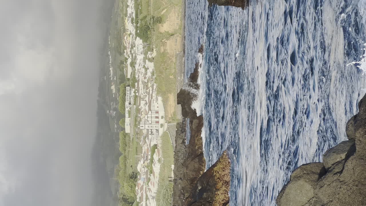 natural ocean sea pool in Sao Miguel island, Azores vertical shot