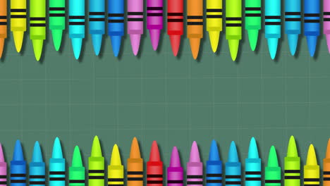 animation of frame of multi coloured crayons with copy space on green background