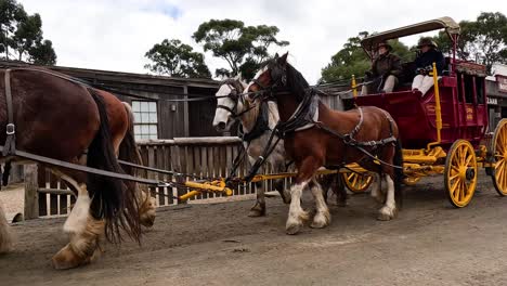 horse-drawn carriage passing through historic town street