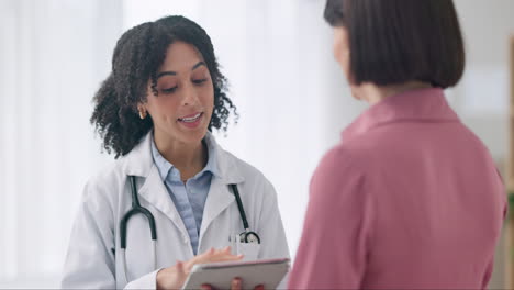 Woman,-doctor-and-consulting-patient-with-tablet