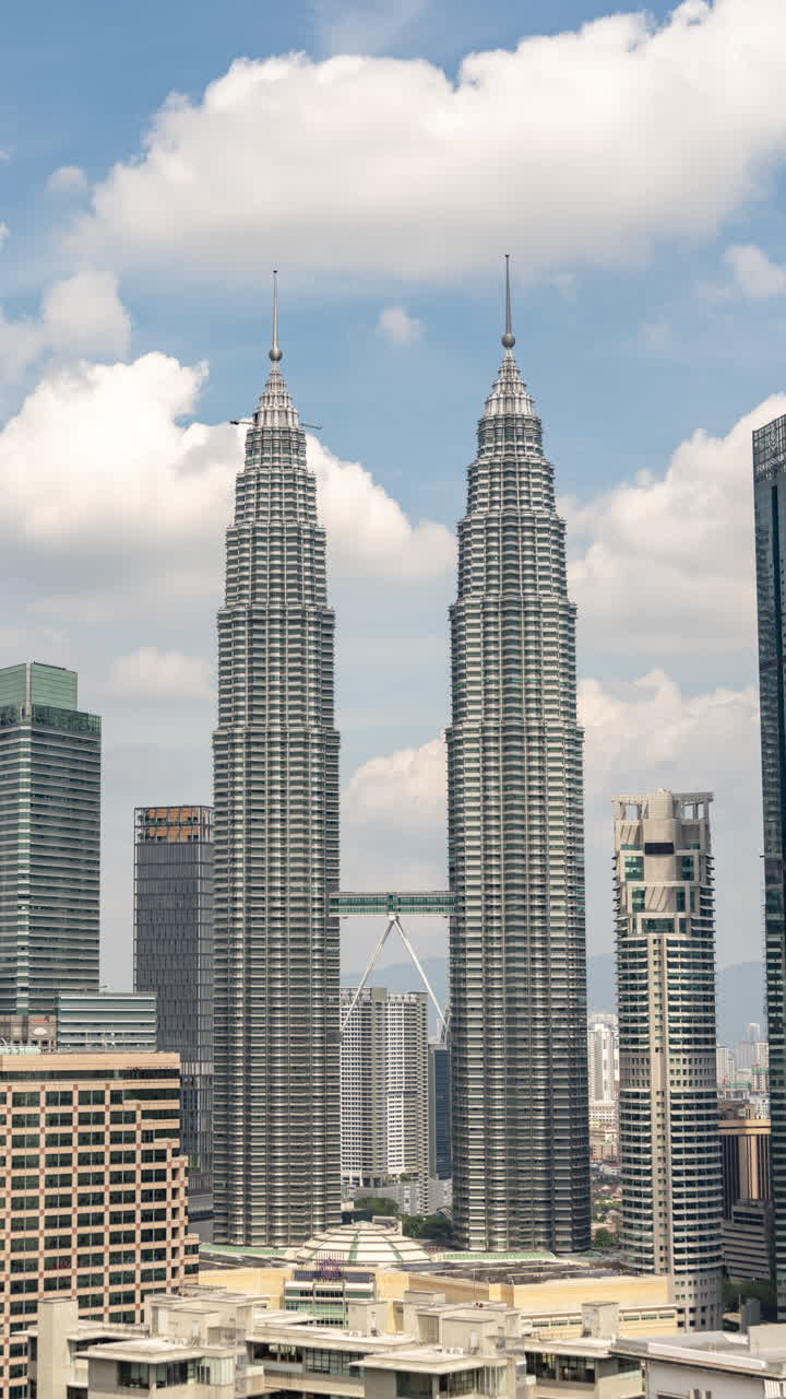 Kuala Lumpur petronas towers and skyline in vertical