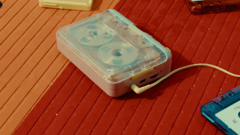 vintage cassette player on a striped surface