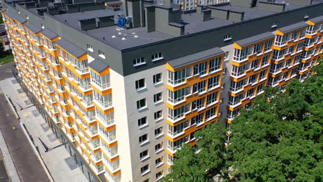 aerial view of a modern multi-family residential building under construction