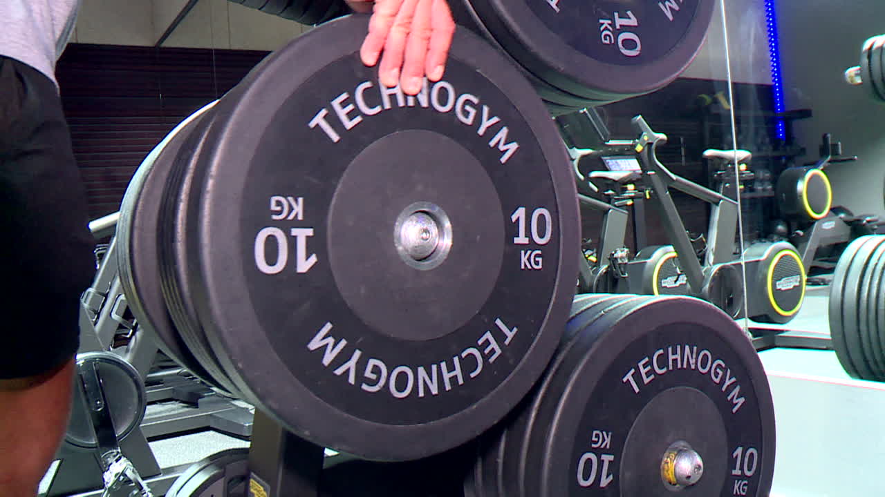 Weightlifting equipment in a modern gym