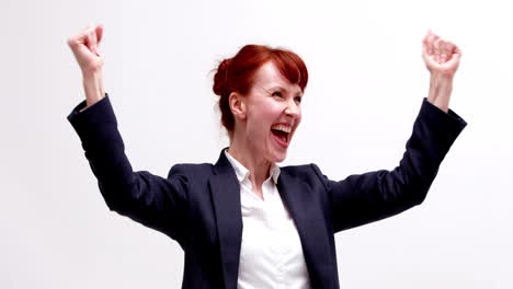 Businesswoman-cheering-on-white-background