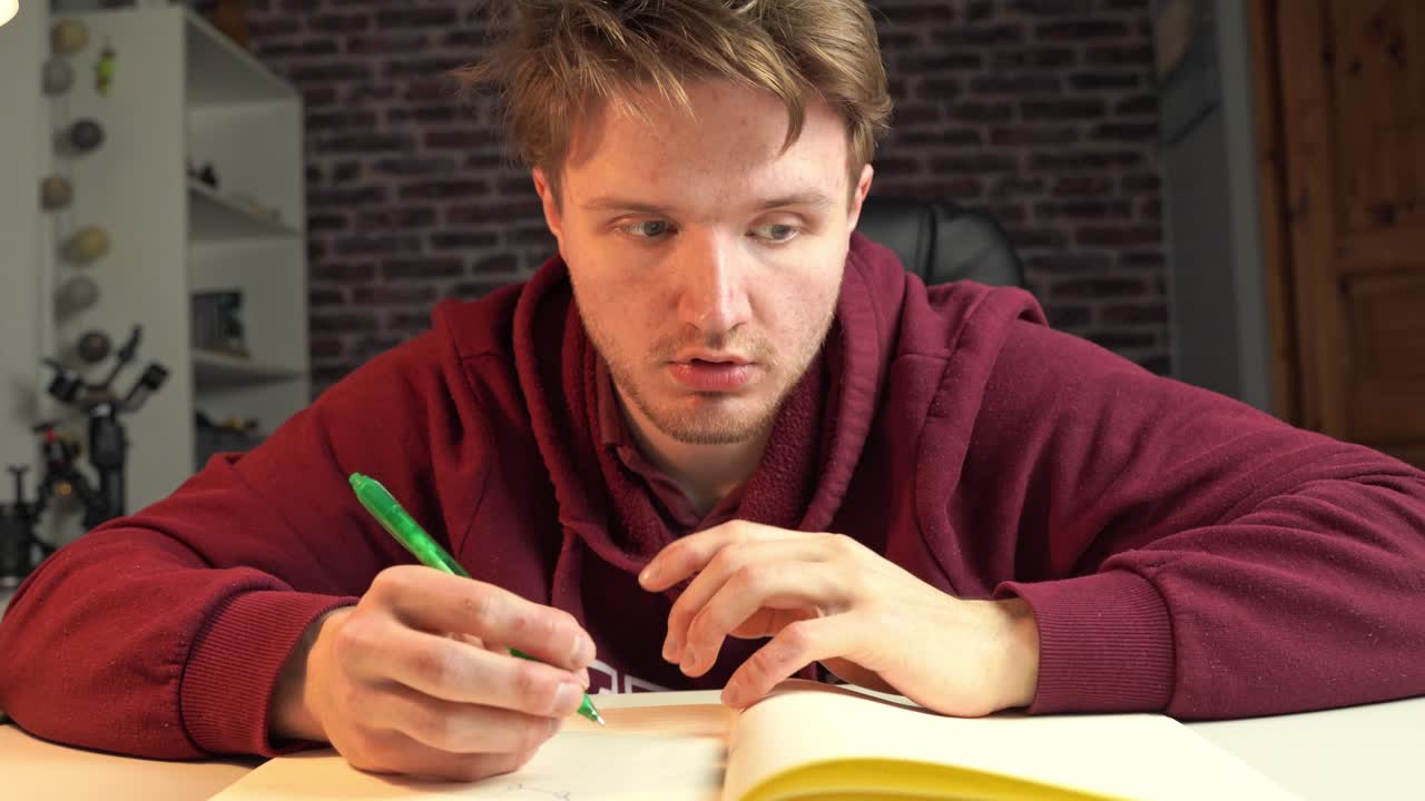 A young man is working on a student project and he thinks of a solution to a complex software engineering issue