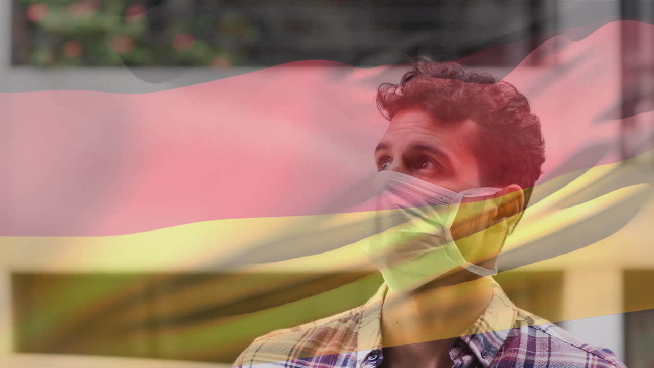 코로나 19 대유행 기간 동안 얼굴 마스크를 쓴 남자가 독일 국기를 흔들고 있는 애니메이션