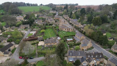 bourton on the hill cotswold village uk drone aerial view in spring