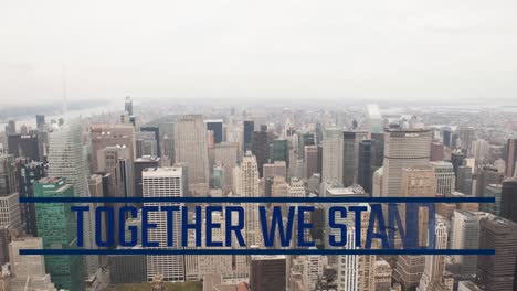 animation of together we stand text over skyscrapers in modern cityscape