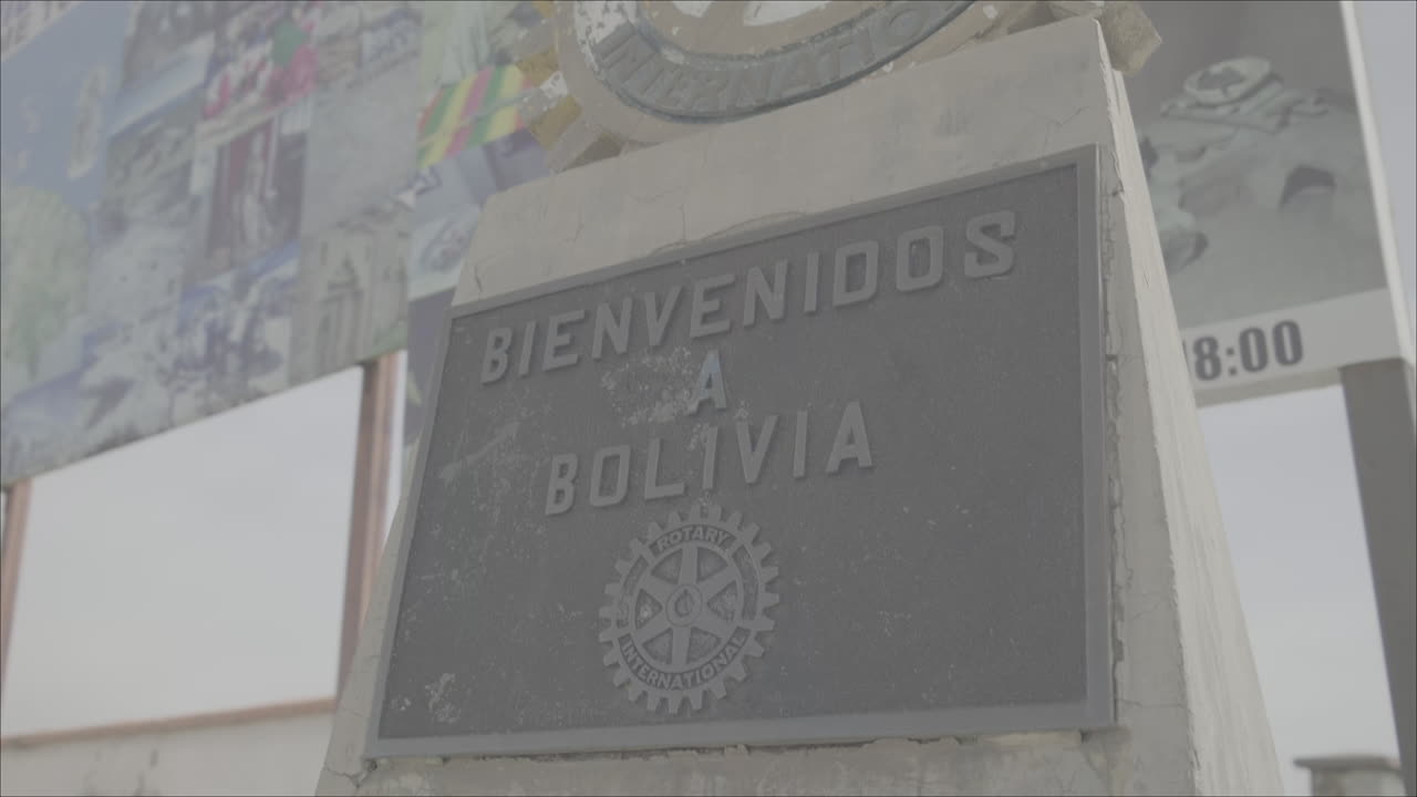 Famous Welcome stone on the border of Bolivia and Peru LOG