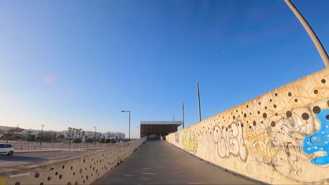 seawall along the costa da caparica beach, providing protection from the waves and creating a scenic view of the ocean