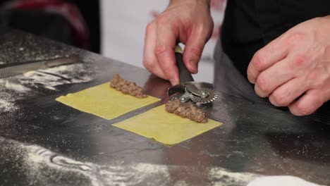 making homemade pasta with meat filling