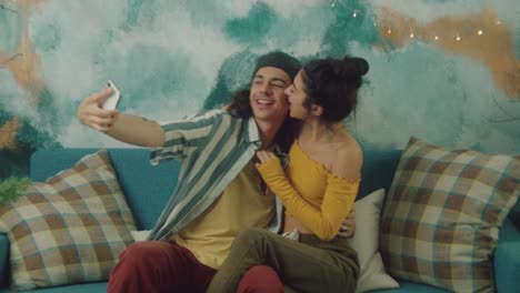 couple taking a selfie at home