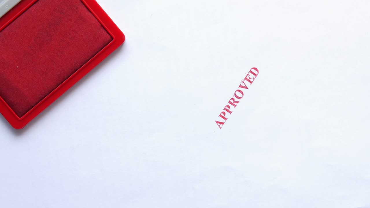 Stamping Document with Approving Contract close up