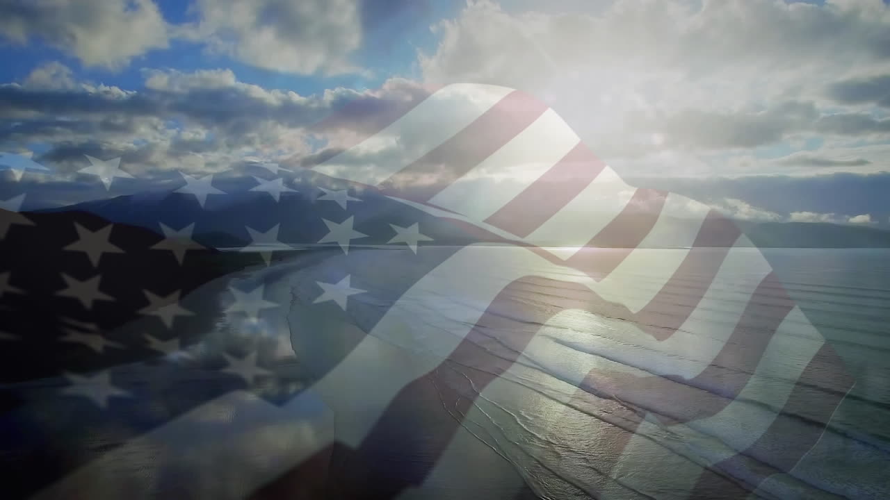 animación de la bandera de los estados unidos ondeando sobre el paisaje de la playa