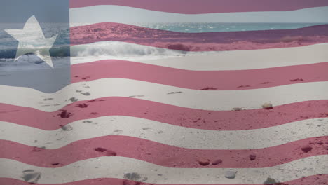 Waving-American-flag-animation-over-beach-with-waves-and-footprints-in-sand