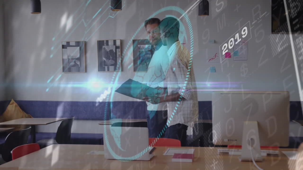 Two people reviewing documents in office with digital data animation overlay