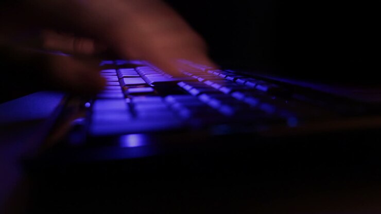 Man hands typing on the blue keyboard Time lapse